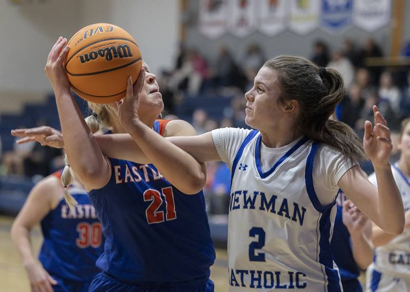 Eastland’s Olivia Klinefelter is fouled by Helen Papoccia Tuesday, Jan. 7, 2025, at Newman High School.