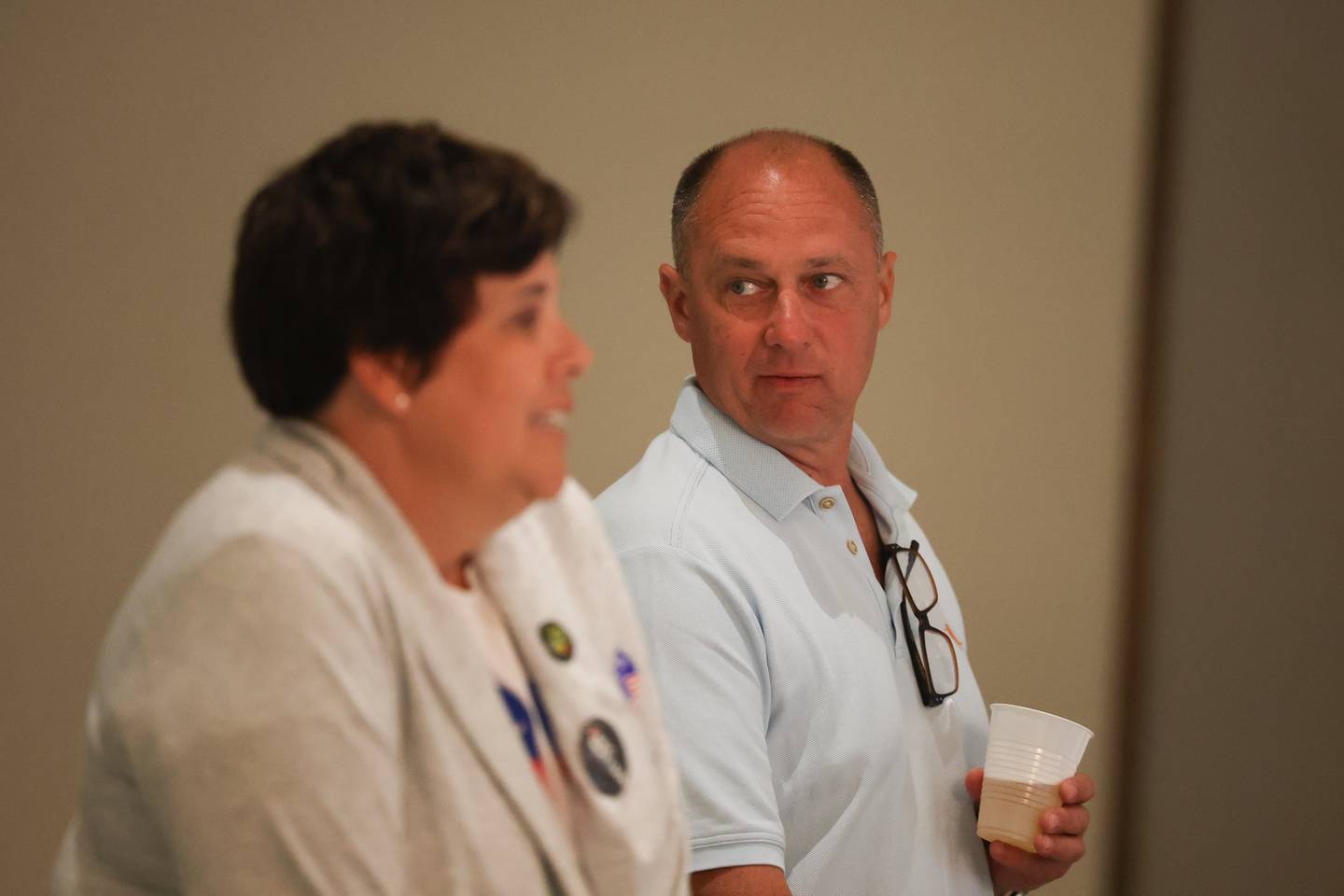 Will County Executive Jennifer Bertino-Tarrant stands with Illinois Senate candidate Eric Mattson as the results for the 43rd District start to come in at his watch party at the IBEW Local 176. Tuesday, June 28, 2022 in New Lenox.
