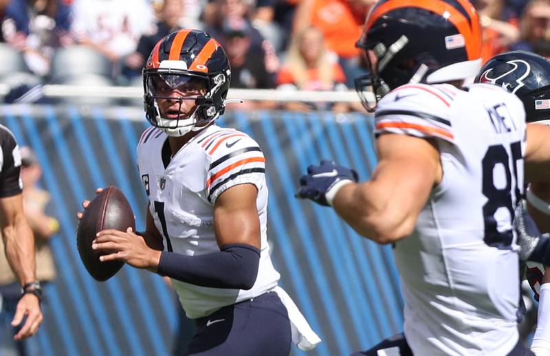 Chicago Bears quarterback Justin Fields looks for tight end Cole Kmet during their game Sunday, Sept. 25, 2022, at Soldier Field in Chicago.