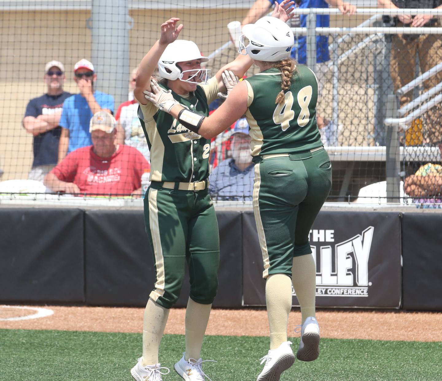 St. Bede's Ella Hermes smiles with teammate Reagan Stoudt after scoring against Illini Bluffs in the Class 1A State championship game on Saturday, June 3, 2023 at the Louisville Slugger Sports Complex in Peoria.