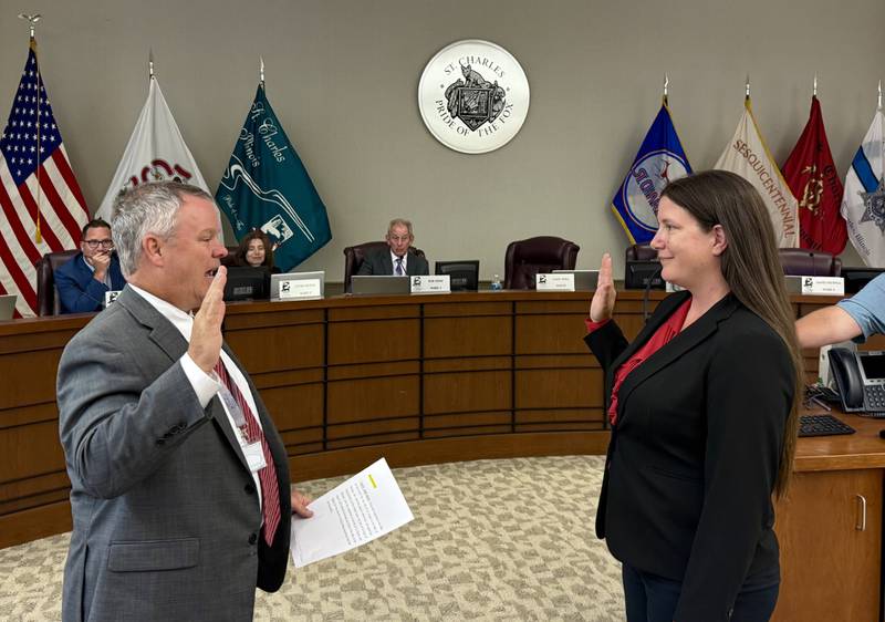 New St. Charles City Clerk Jessica Bridges is sworn in by Mayor Clint Hull during the July 7, 2025, City Council meeting in City Hall.