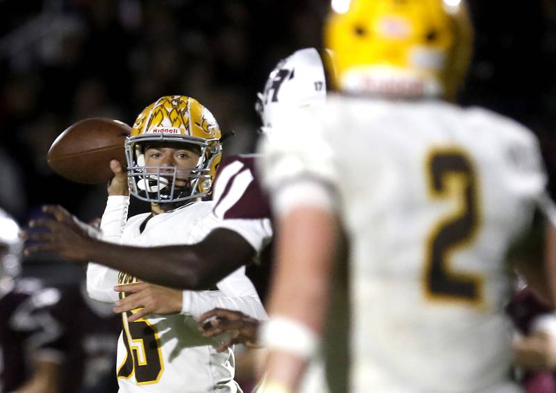 Jacobs' Austin Stennett throws a pass during a Fox Valley Conference football game Prairie Ridge on Friday, Sept. 5, 2025, at Prairie Ridge High School in Crystal Lake.