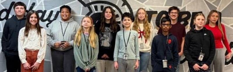 Sycamore Middle School Students of the Month for January. The sixth grade students are Adrian Ibarra, Sri Katakam, Emmaline Sauber, and Hannah Tallacksen. The seventh grade students are Leon Halatek, Jordan McNeil, Savannah Sellers, and Dempsey Webb. The eighth grade students are Esme Beckley, Connor Franz, William Mosca, and Aislinn Wickness.