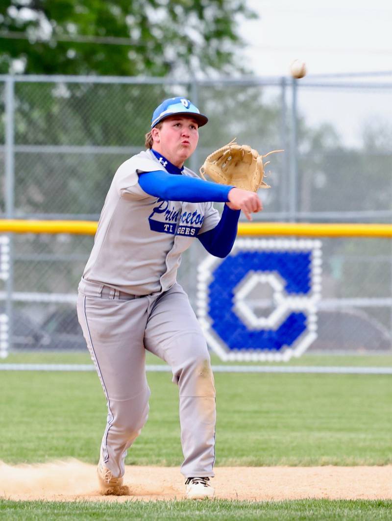 Princeton short stop Jordan Reinhardt throws to first during Monday's 5-2 regional semifinal loss to Kewanee at Prather Field
