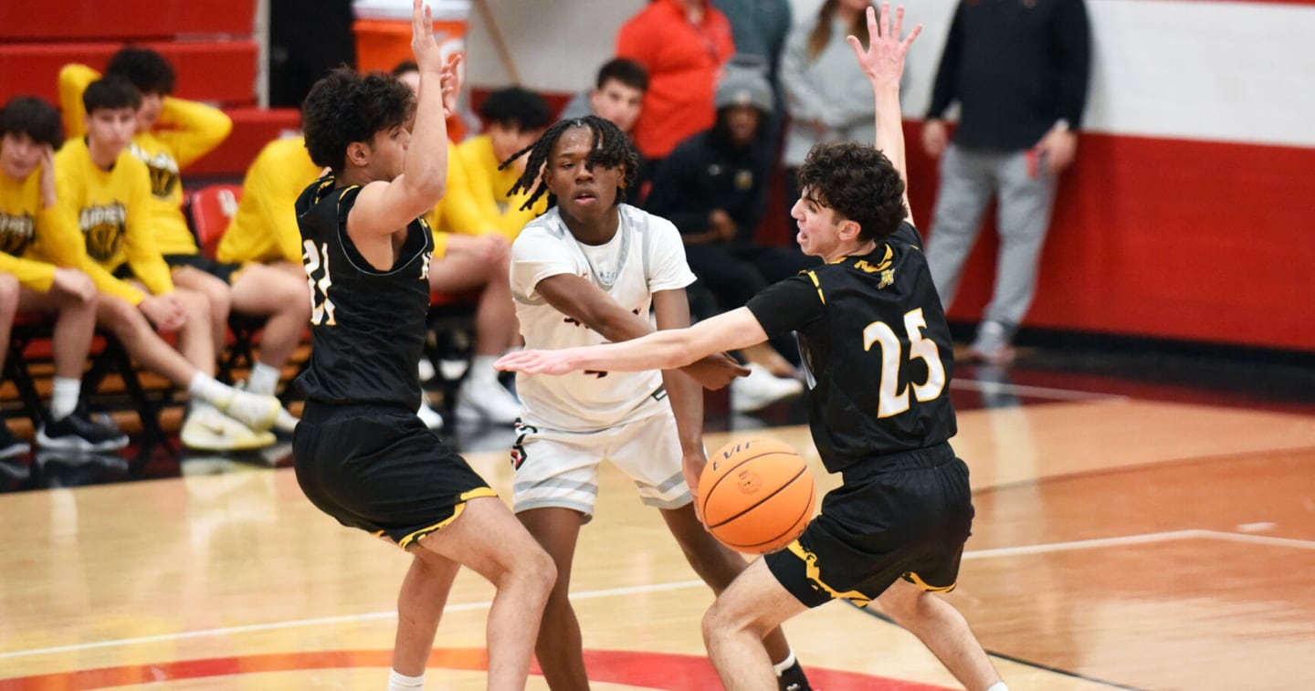 Bradley-Bourbonnais' Kobe Lawrence passes out of an Andrew double team during Tuesday's game at Bradley-Bourbonnais.