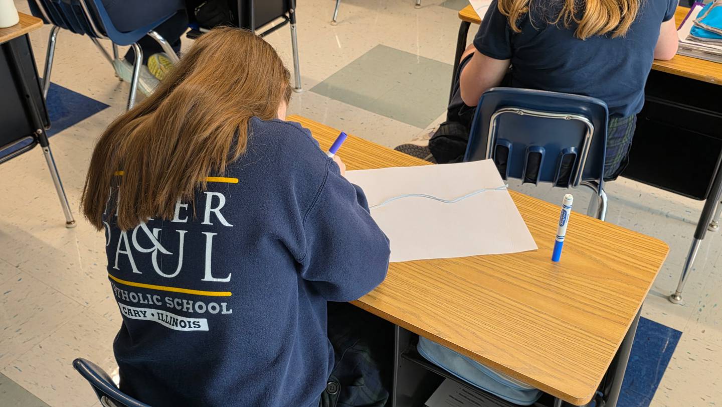 A Saints Peter and Paul eighth grader works on a leadership activity on April 23, 2026.