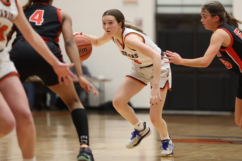 Lincoln-Way West’s Ava Gugliuzza looks for a play against Lincoln-Way Central on Tuesday, February 7th..