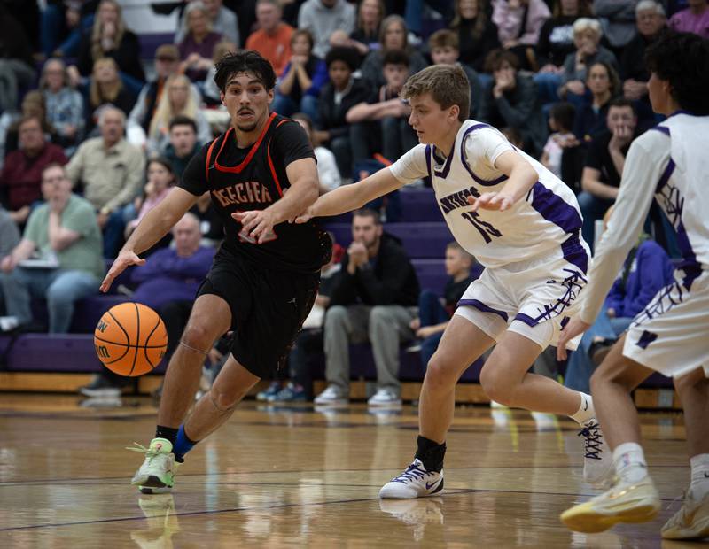 Beecher's Duke Doran, left, controls the ball as Manteno's Colin Saathoff, right, defends in the Thanksgiving tournament at Manteno High School on Monday, November 24, 2025.