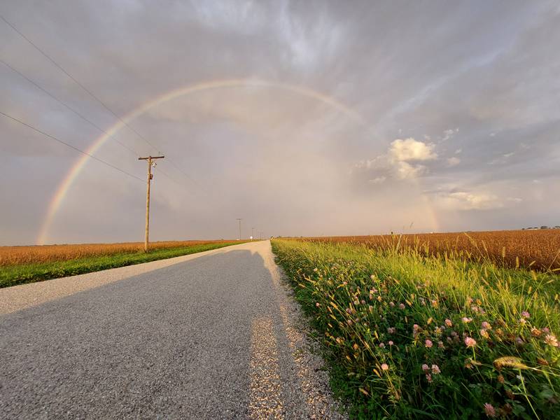 Just before sunset Monday, the sunshine and a rain shower combined to make a full rainbow between Ottawa and Streator, along Route 23. The rainbow arched over the oranges and ambers of the fields during harvest time to create a colorful scene.