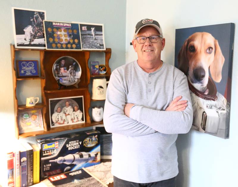 Scott Pellican of La Salle poses with his space memorabilia at his home on Wednesday Feb, 9, 2022 in La Salle. Pellican has recently been named a NASA ambassador, a volunteer authorized to talk about the space program at area schools, community groups and libraries. Pellican has followed the space program since he was 8, when he began following the Gemini and Apollo missions and started collecting NASA memorabilia.