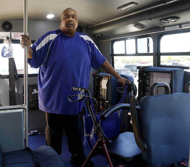 Dennis Brown, who was severely injured his leg in 2010, and received township general assistance while he was awaiting surgery, boards the township bus service to return home after shopping at Mejier on Wednesday, May 10, 2023.