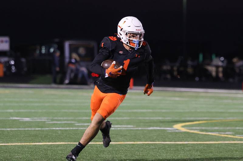 Plainfield East’s Jayden Cawthon cuts upfield after a catch against Joliet Central on Oct. 4, 20234 in Plainfield.