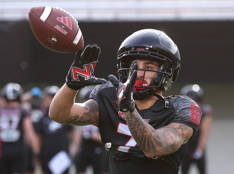 Northern Illinois University wide receiver Cam Thompson makes a catch Tuesday, April 14, 2026, during a drill at spring practice in Huskie Stadium at NIU in DeKalb.
