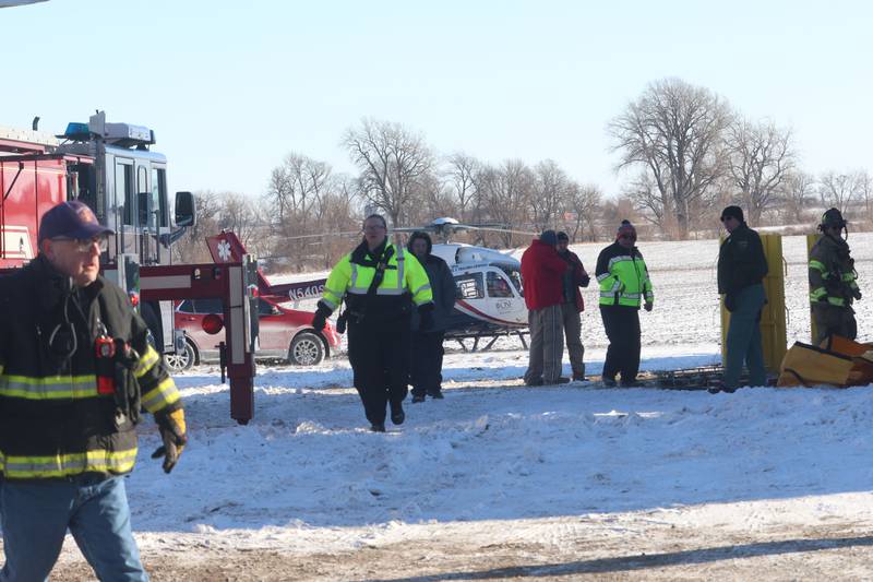 Lifeflight helicopter along with emergency personnel, work the scene of a grain bin rescue on Monday, Jan. 26, 2026 in the 13000 block of North 950th Avenue just south of Granville. Two lifeflight helicopters laned and one victum was flown from the scene.