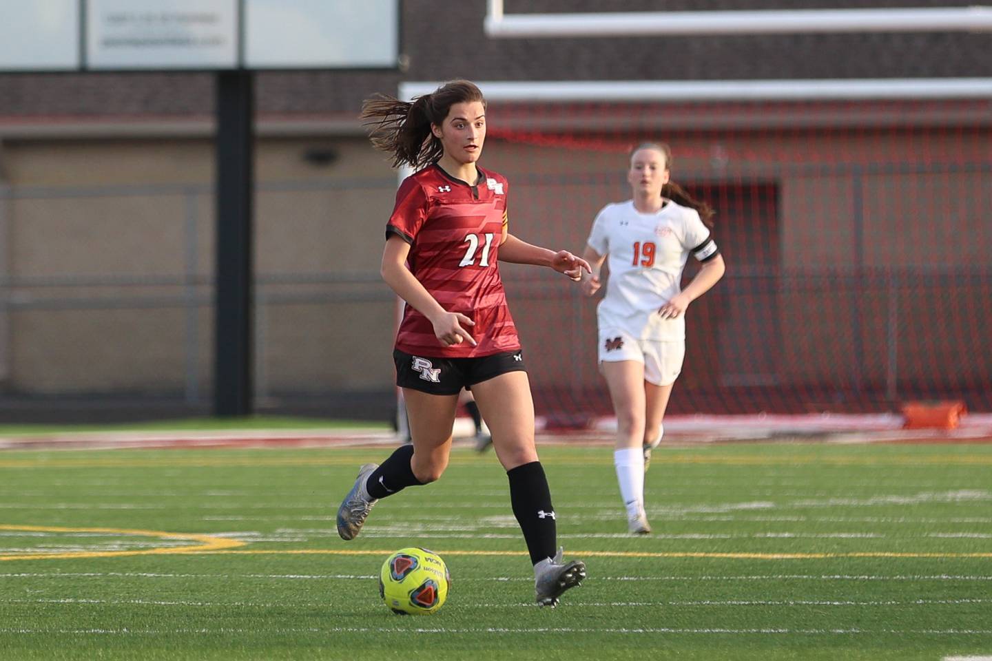 Plainfield North’s Georgia Liapis looks for a play against Minooka. Monday, Mar. 14, 2022, in Plainfield.