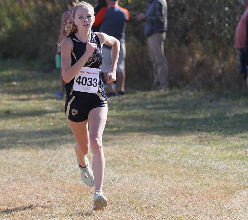 Marquette's Keely Nelson runs in the Class 1A Regional Cross Country gils race on Saturday, Oct. 22, 2022 at the Seneca FFA Farm in Marseilles.
