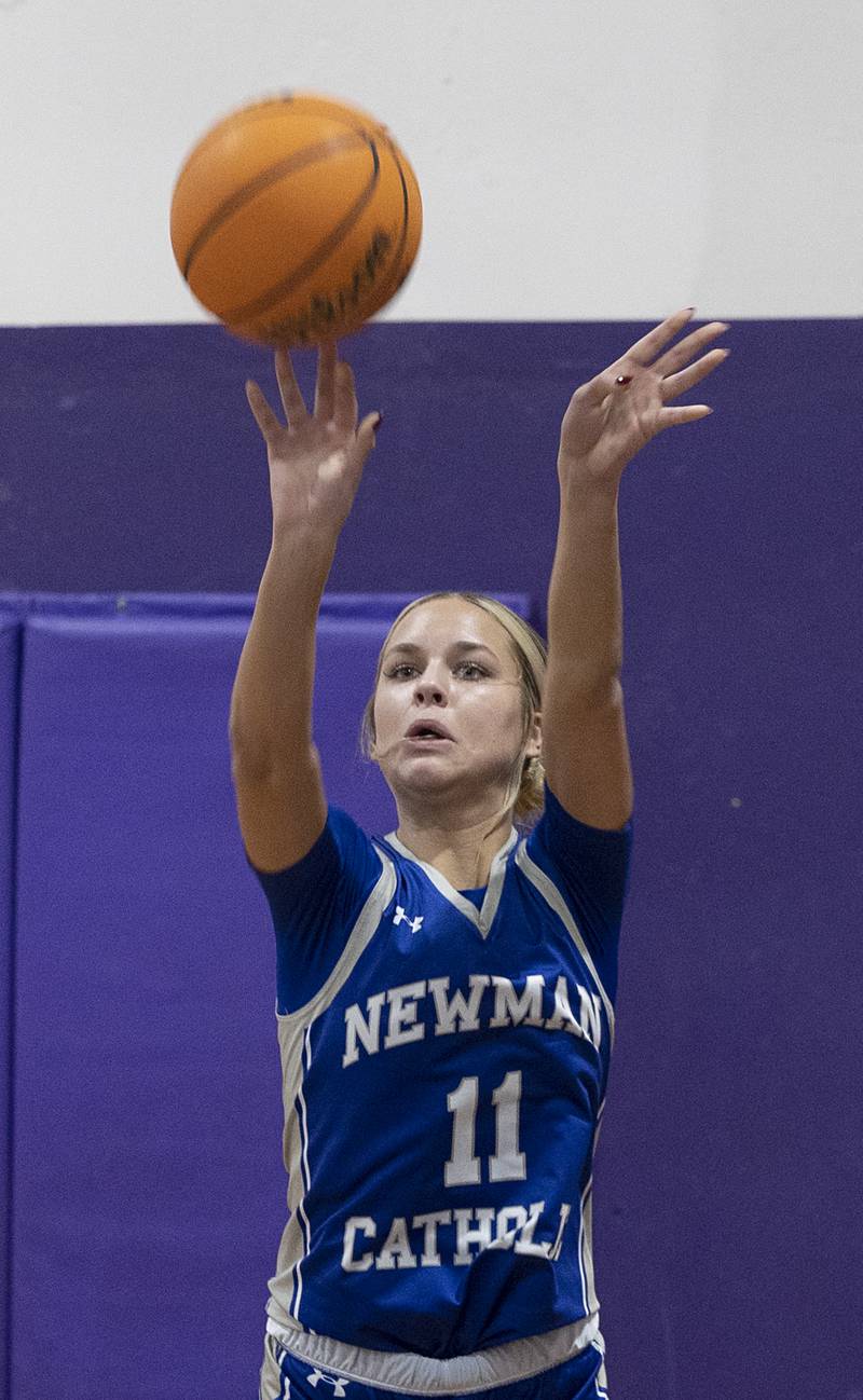 Newman’s Brooklyn Smith puts in a three-point bucket against Alleman Friday, Dec. 26, 2025, at the Duchesses Basketball Christmas Classic.