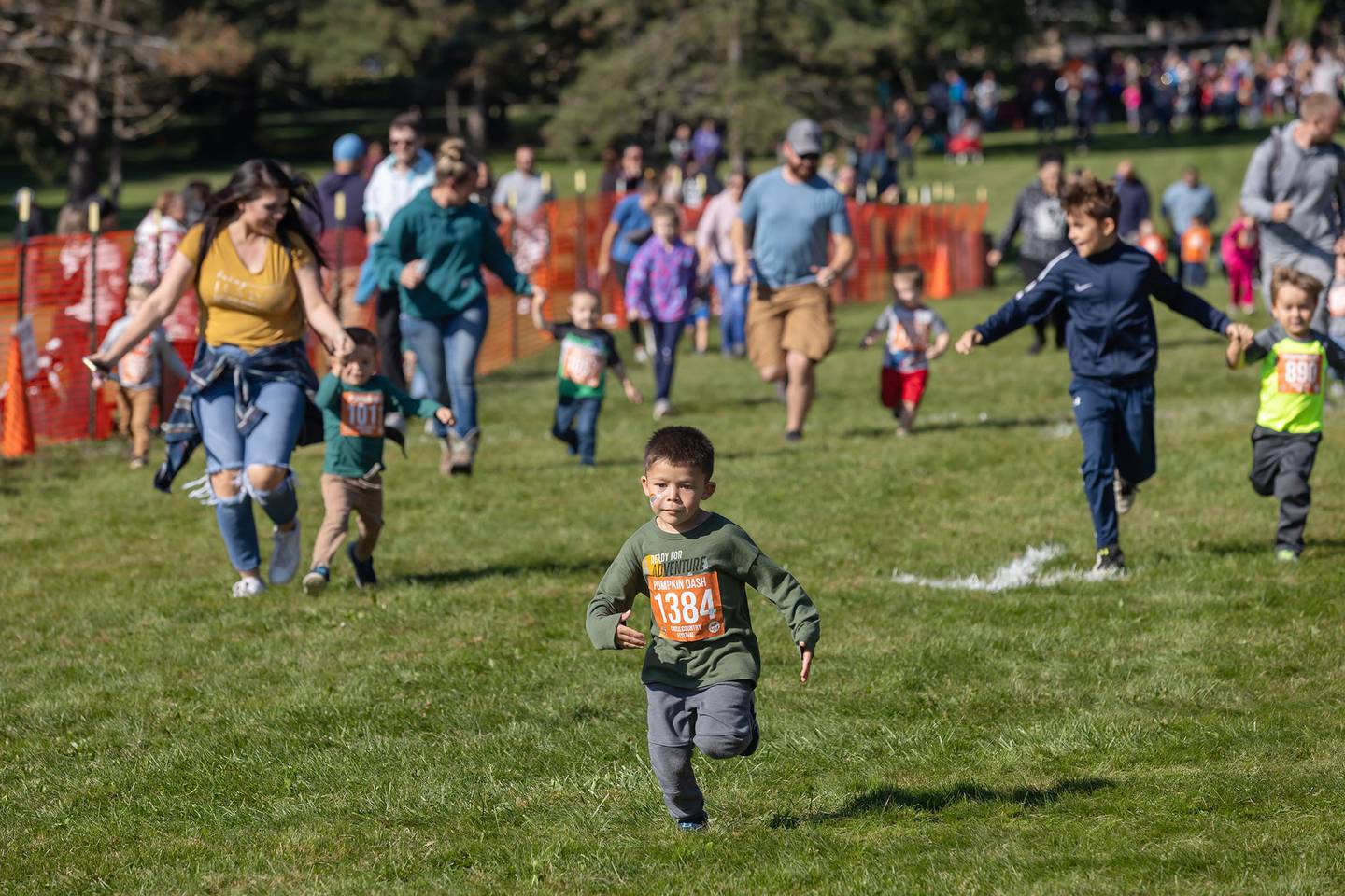 Kids dash for the finish line Saturday, Oct. 1, 2022 during the annual Sterling Park District Pumpkin Dash.