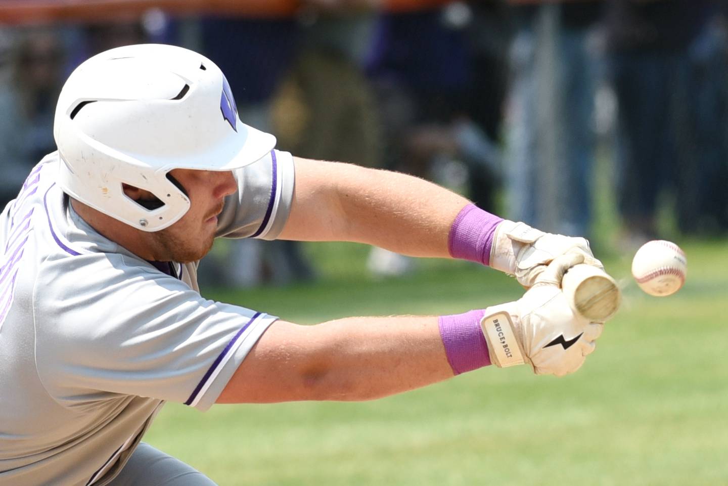 Wilmington's Zach Ohlund bunts the ball during the Class 2A Beecher Sectional championship game agaisnt Bishop McNamara Saturday, May 31, 2025.