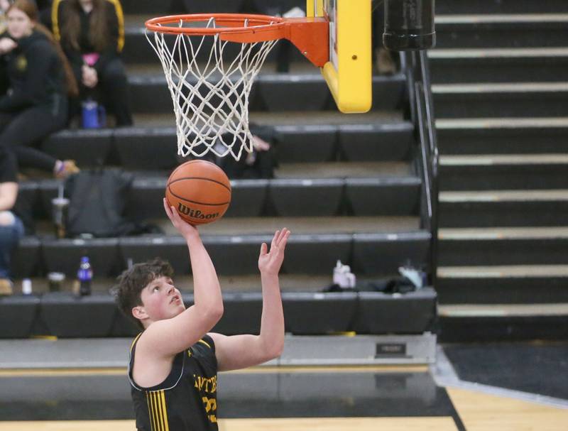 Putnam County's Jaden Stoddard runs in all alone to score a basket during the Tri-County Conference Tournament on Tuesday, Jan. 23, 2024 at Putnam County High School.