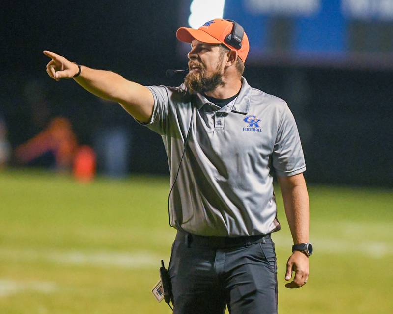 Genoa-Kingston's head coach Cam Davekos asks officials to talk before the next play to confirm the Stillman Valley touchdown stands on Friday Oct. 11, 2024, held at Genoa-Kingston High School.