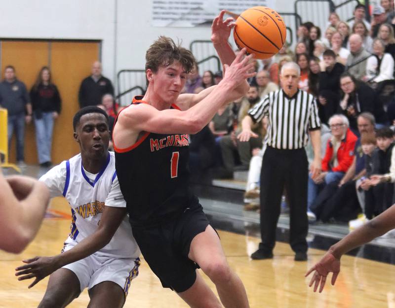McHenry’s Dylan Hurckes moves the ball against Warren in IHSA Class 4A Regional Title Game boys basketball action on Friday, Feb. 28, 2025 at McHenry High School in McHenry.