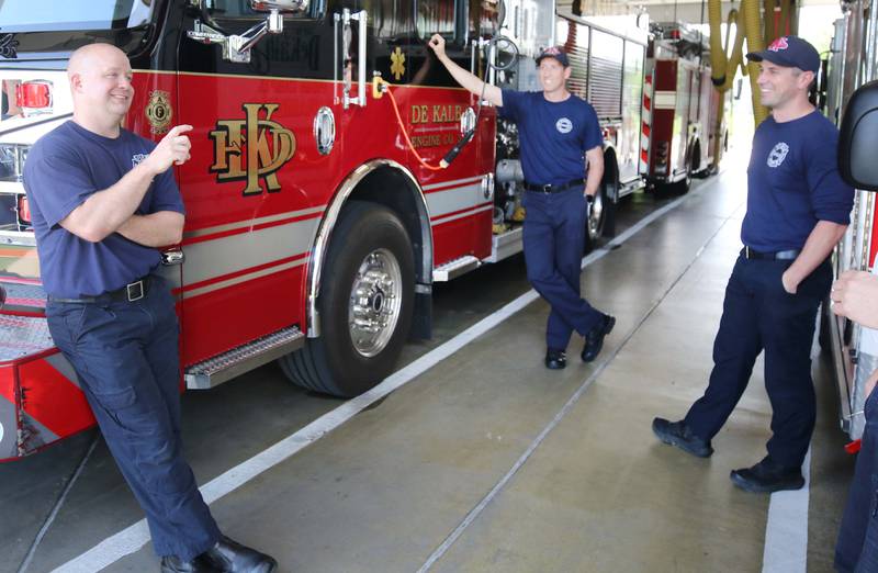 DeKalb firefighters chat in the apparatus bay Tuesday, May 16, 2023, at Fire Station 3 in DeKalb.