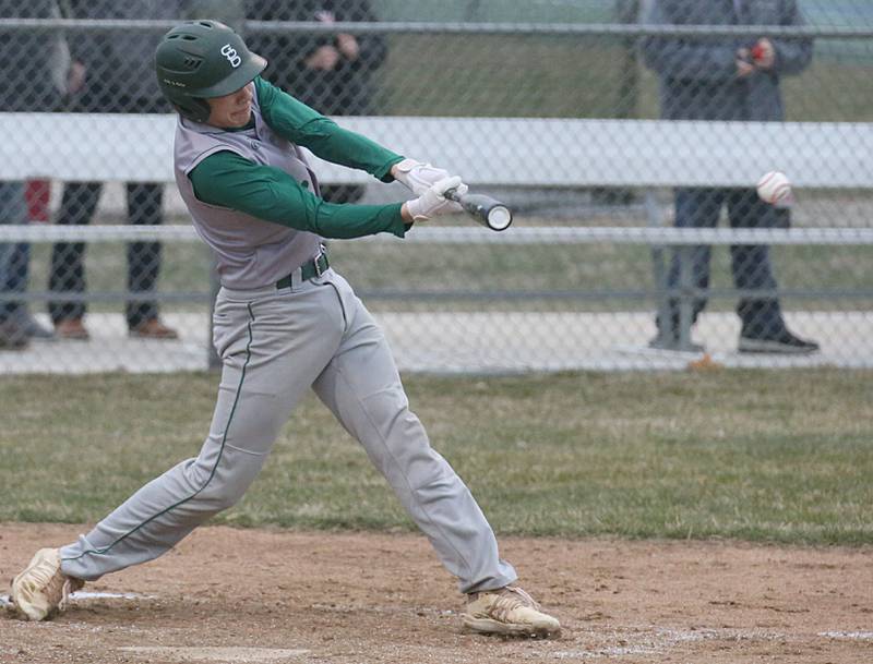 St. Bede's Nathan Husser hits the ball against Ottawa on Wednesday, March 22, 2023 at Ottawa High School.