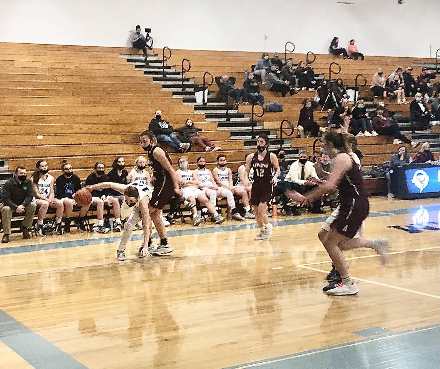 Bureau Valley senior Kyra Stoller is tripped up by Annawan's Zoey Vance in the second half Thursday night at the Storm Cellar.