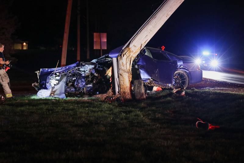 The Harvard Fire Protection District freed a driver trapped in his car after crashing into a utility pole Thursday, April 24 near Harvard.