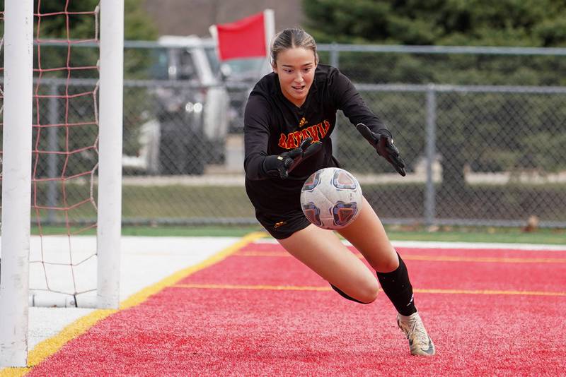 Batavia’s Gianna Reid dives for a loose ball in front of the net during a soccer match against Oswego East at Batavia High School on Saturday, March 29, 2025.