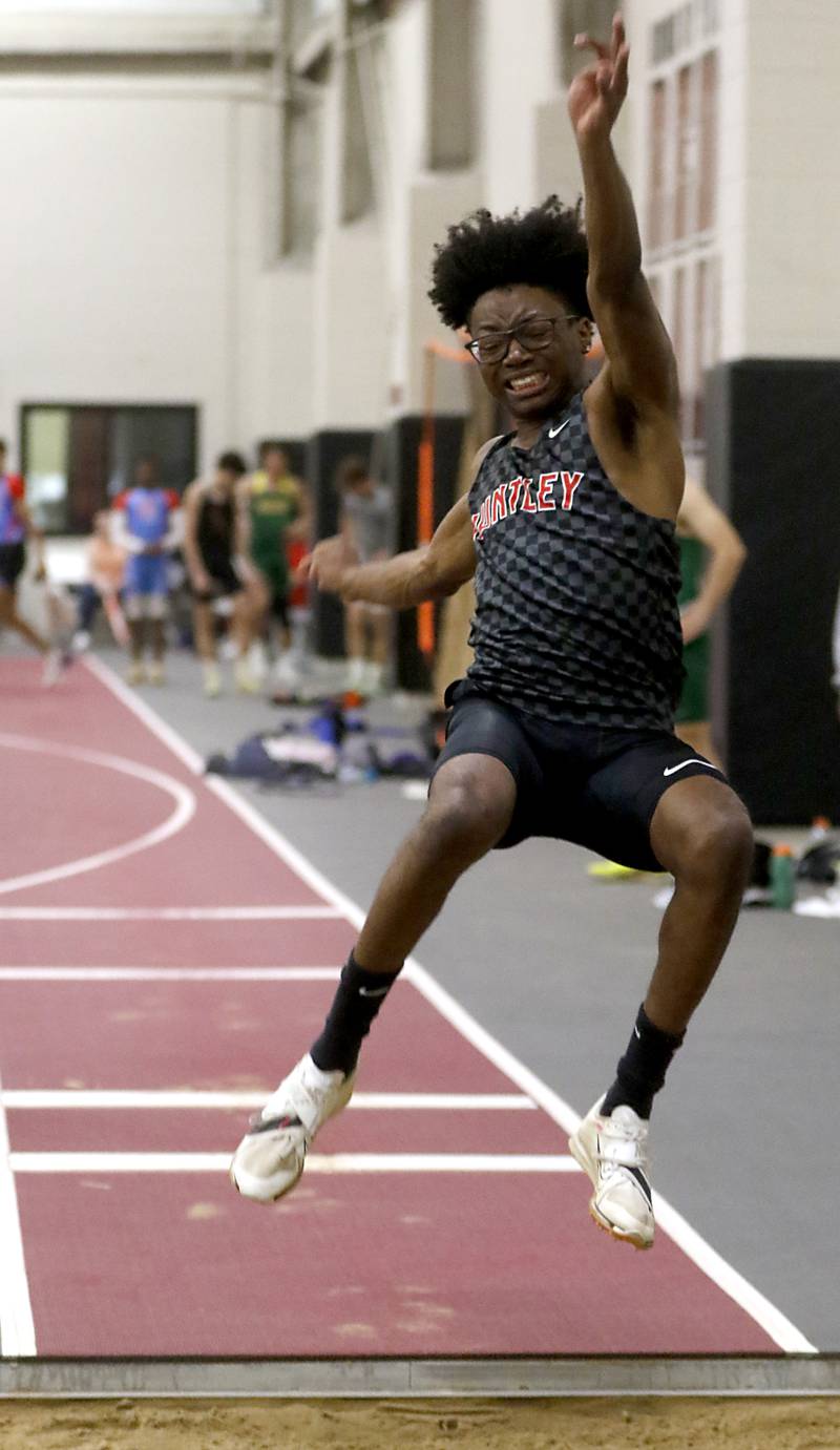 Huntley's McHale Hood long jumps Friday, May 12, 2023, during the Fox Valley Conference Boys Track and Field Meet at Huntley High School.