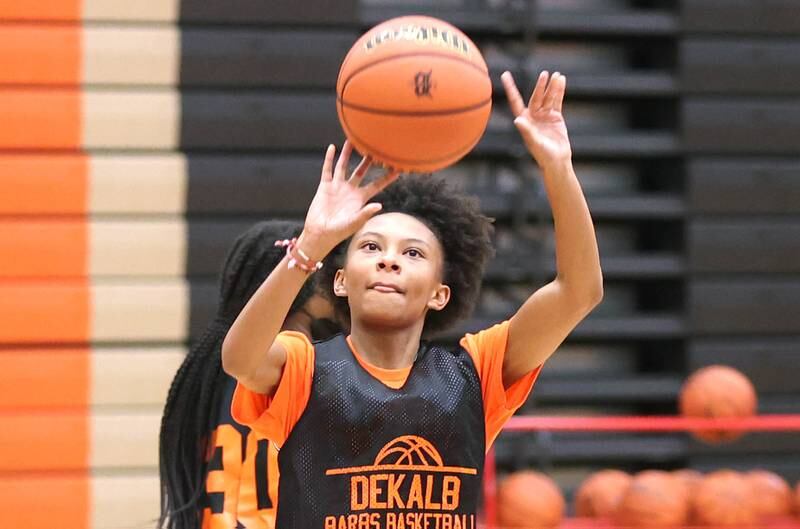 DeKalb's Madison McNeil shoots a jumper Thursday, June 23, 2022, at girls basketball practice at DeKalb High School.