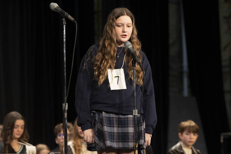 Sterling St. Mary’s 6th grader Ellie Mason competes Thursday, Feb. 21, 2024 at the Lee-Ogle-Whiteside regional spelling bee. Mason missed on the word “awry” in round two.