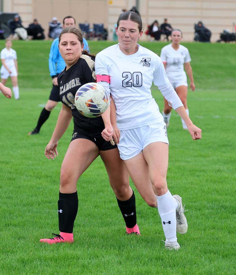 Sycamore's Charlotte Yates and Kaneland's Erin Doucette go after a throw-in during their game Wednesday, April 29, 2026, at Sycamore High School.