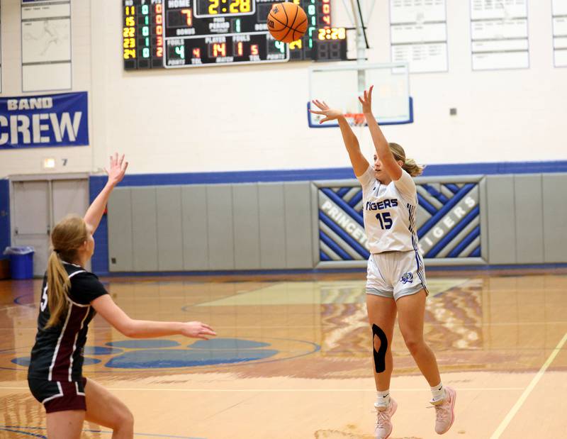 Princeton's Ava Munson shoots a wide-open jump shot over Illinois Valley Centra's Taryn Johnigk during the Princeton High School Girls Basketball Holiday Tournament on Saturday, Nov. 22, 2025 at Princeton HIgh School.