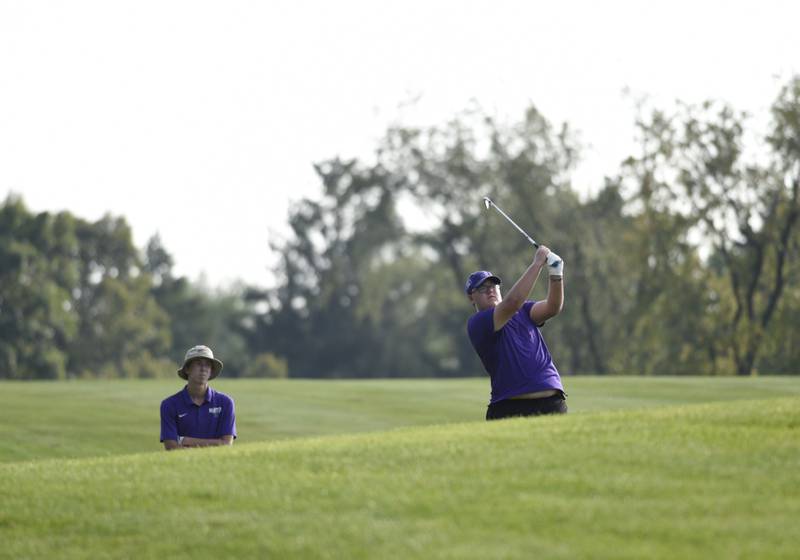 Manteno's Carson Russert shoots for the green at Minne Monesse Golf Club as Landon Bukowski watches on Friday, August 15, 2025.