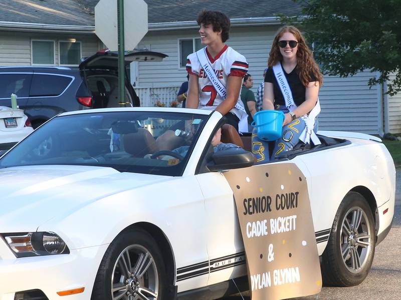 Putnam County High School senior court students Dylan Glynn and Cadie Bickett ride during the inaugural Homecoming parade on Wednesday, Sept. 17, 2025 down Elm Street in Granville.