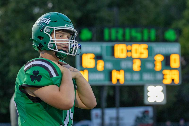 Breckin Anderson (75) of Seneca holds collar as he watches on as Seneca plays 2025 home opener game against Chicago Christain on Friday, Aug 29, 2025 at Seneca High School in Seneca.
