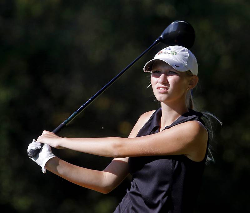 Crystal Lake Central’s Rylee Rud watches her tee shot on the 5th hole during the Fox Valley Conference Girls Golf Tournament Wednesday, Sept. 25, 2024, at Crystal Woods Golf Club in Woodstock.