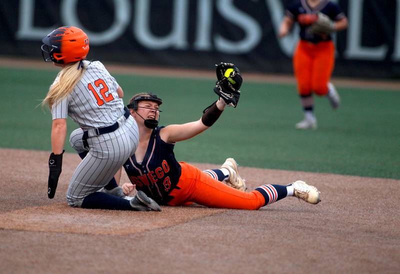 Oswego's Kennedy Gengler gets Oak Park-River Forest's Maura Carmody out at second base during a IHSA Class 4A state semifinal game on Friday, June 13, 2025 at the Louisville Slugger Sports Complex in Peoria.