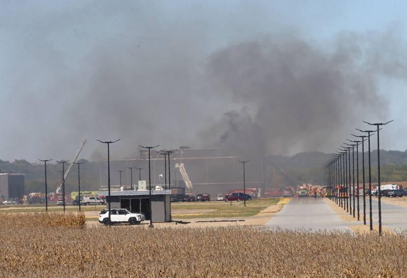 Smoke billows from Marquis Energy as firefighters work to control a structure fire on Wednesday, Oct. 8, 2025 in Hennepin. The fire was upgraded to a 5th alarm dispatching the (MABAS) Mutual Aid Box Alarm System. The fire broke out around 11a.m.