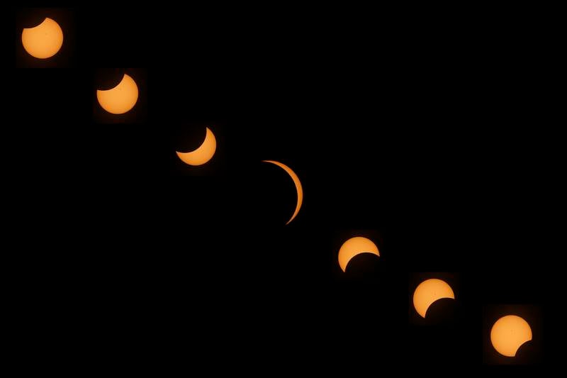 Stages of the partial eclipse on Monday, April 8, 2024, as scene from Crystal Lake.This is a composite image made up of seven images.