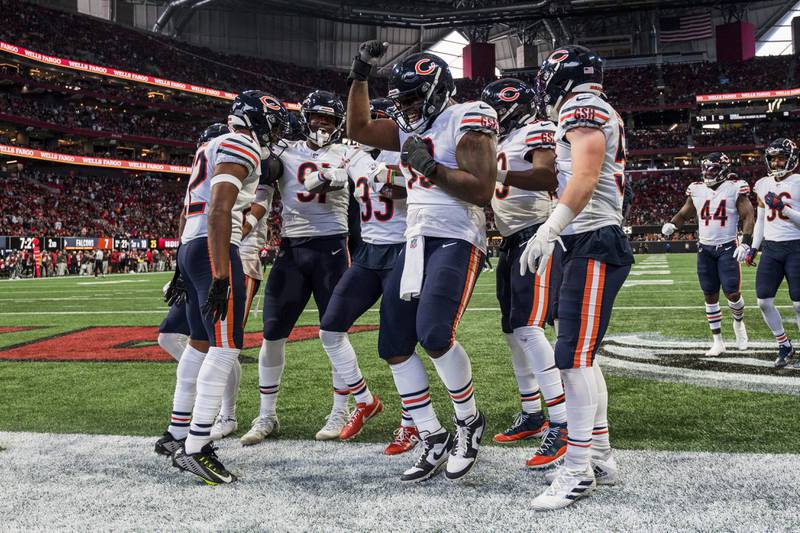 Chicago Bears defensive players celebrate during the first half against the Atlanta Falcons, Sunday, Nov. 20, 2022, in Atlanta.