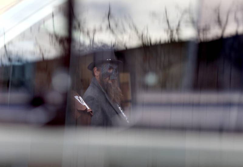 A trick or treater is reflected in a mirror during Halloween on the Square on Thursday, Oct. 31, 2024, in Woodstock. The event featured trick and treating and a costume contest.