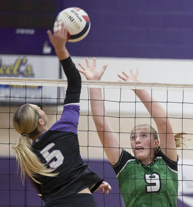 Rock Falls’ Kayla Hackbarth goes up for a block against Dixon’s Morgan Hargrave Thursday, Sept. 18, 2025.