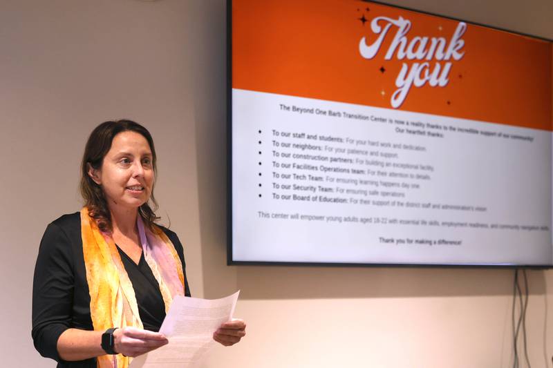 Jessica Marcellis-Montavon, DeKalb School District 428 Transition Program teacher and vocational coordinator, speaks Wednesday, Jan. 22, 2025, during the grand opening celebration of the Beyond One Barb Transition Center in DeKalb. The the transition program has been in place to facilitate students with intellectual and developmental disabilities aged 18-22 into adulthood and independent living.