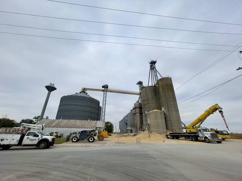 Harvested beans cover the ground after a concrete grain bin collapsed on Wednesday, Oct. 15, 2025, at the Donovan Farmers Co-op in downtown Martinton at the Union Pacific Railroad line. No injuries have been reported and the power is out, according to the Iroquois County EMA.