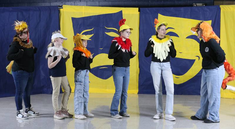 Sofia Scutt, Hannah Skelly, Edythe Brockman, Genevieve Vicich, Ceci Reynolds and Irene Vicich act out a scene during a rehearsal of "Once Upon A Time" on Tuesday, Nov. 12, 2024 at Marquette Grade School. The production is a story theatre featuring a collection of stories written from the stories in the collection of the Grimm Brothers and Aesop's Fables.