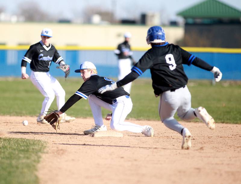 Burlington Central’s Wagner Viebrock makes a catch at second to get St. Charles North’s Matt Kelly out during a game on Tuesday, April 8, 2025 at Burlington Central.